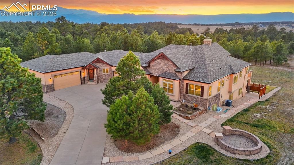 Breathtaking sunset views from luxurious ranch-style home featuring adjoining casita
