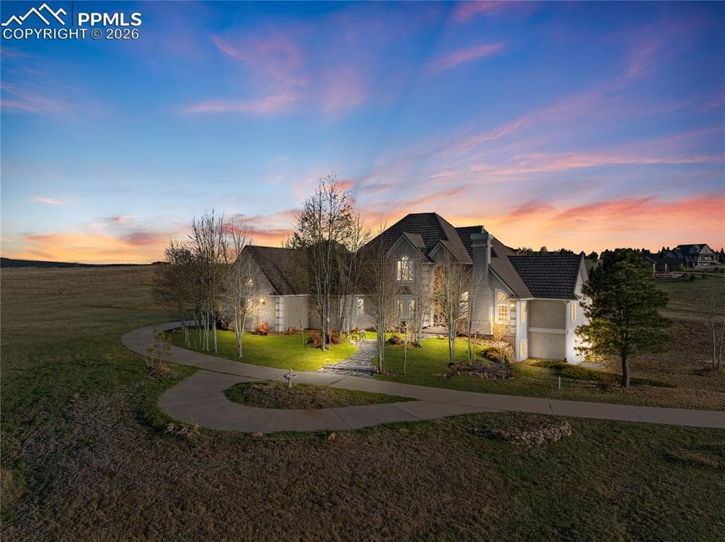 Front of home with virtual sunset 