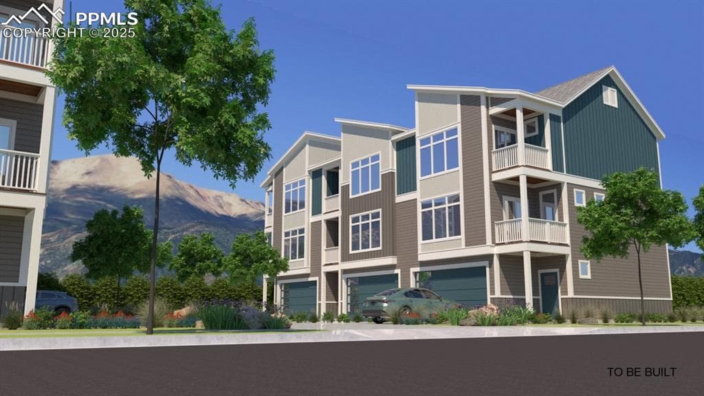 View of property with a mountain view